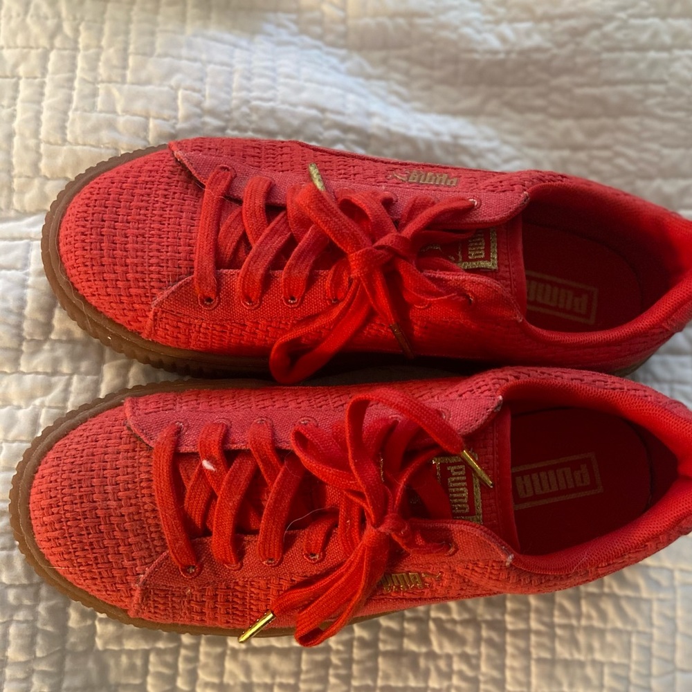 Red platform puma shoes